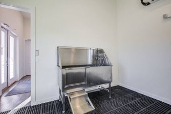 Fenced bark park and self-serve dog grooming spa